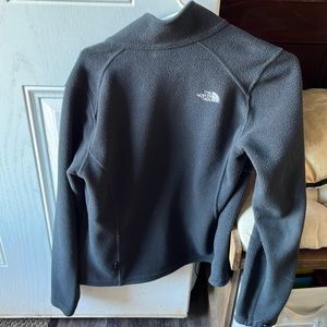 Dark grey fuzzy medium north face woman’s jacket